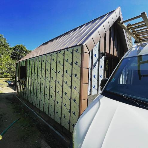 Réalisation d'une extension avec pose d'un bardage en zinc