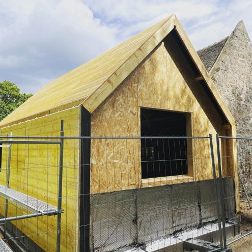 Réalisation d'une extension avec pose d'un bardage en zinc