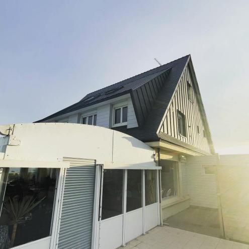 Réfection d'une toiture en ardoises naturelles et bardage en aluminium
