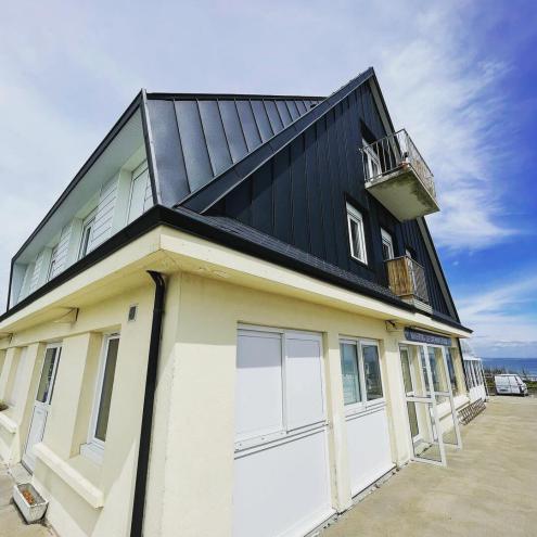 Réfection d'une toiture en ardoises naturelles et bardage en aluminium