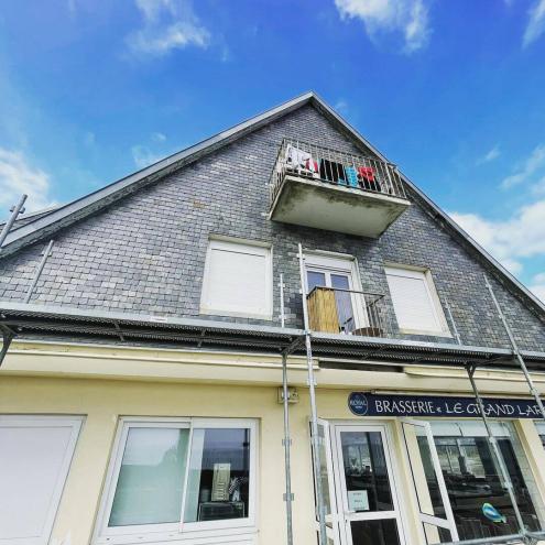 Réfection d'une toiture en ardoises naturelles et bardage en aluminium